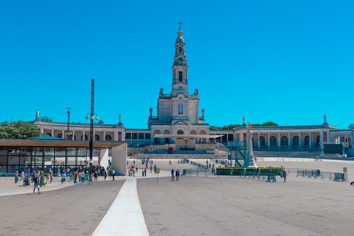 The open esplanade of the Sanctuary of Fátima under a wide sky