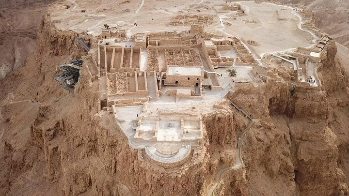 First light over the Masada plateau with the Dead Sea below