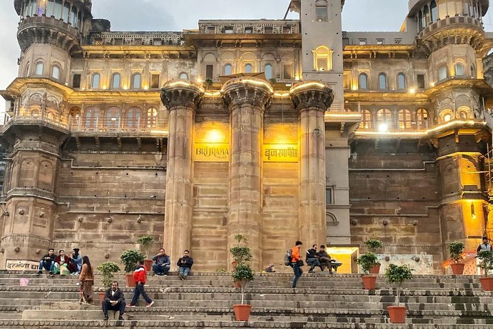 Stone ghat steps descending to the Ganges at Varanasi in soft morning light