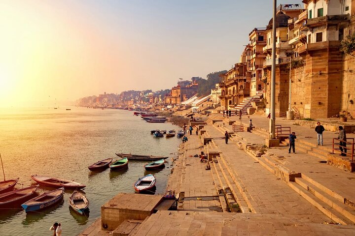 Lamps and pilgrims along the ghats of Varanasi on the Ganges