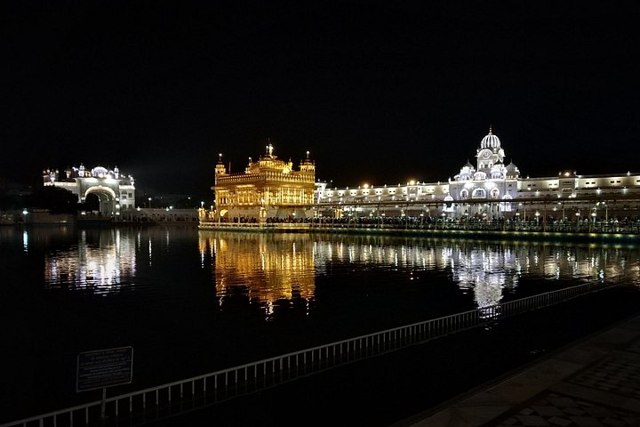 Golden Temple illuminated across the Amritsar sarovar