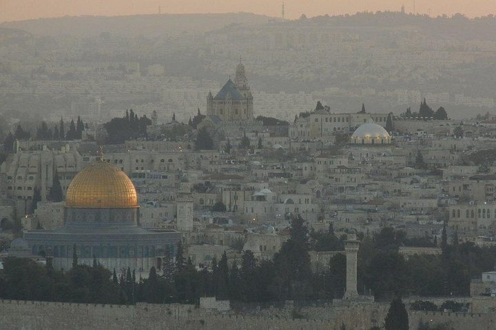 Jerusalem Old City skyline with sacred landmarks across the stone rooftops